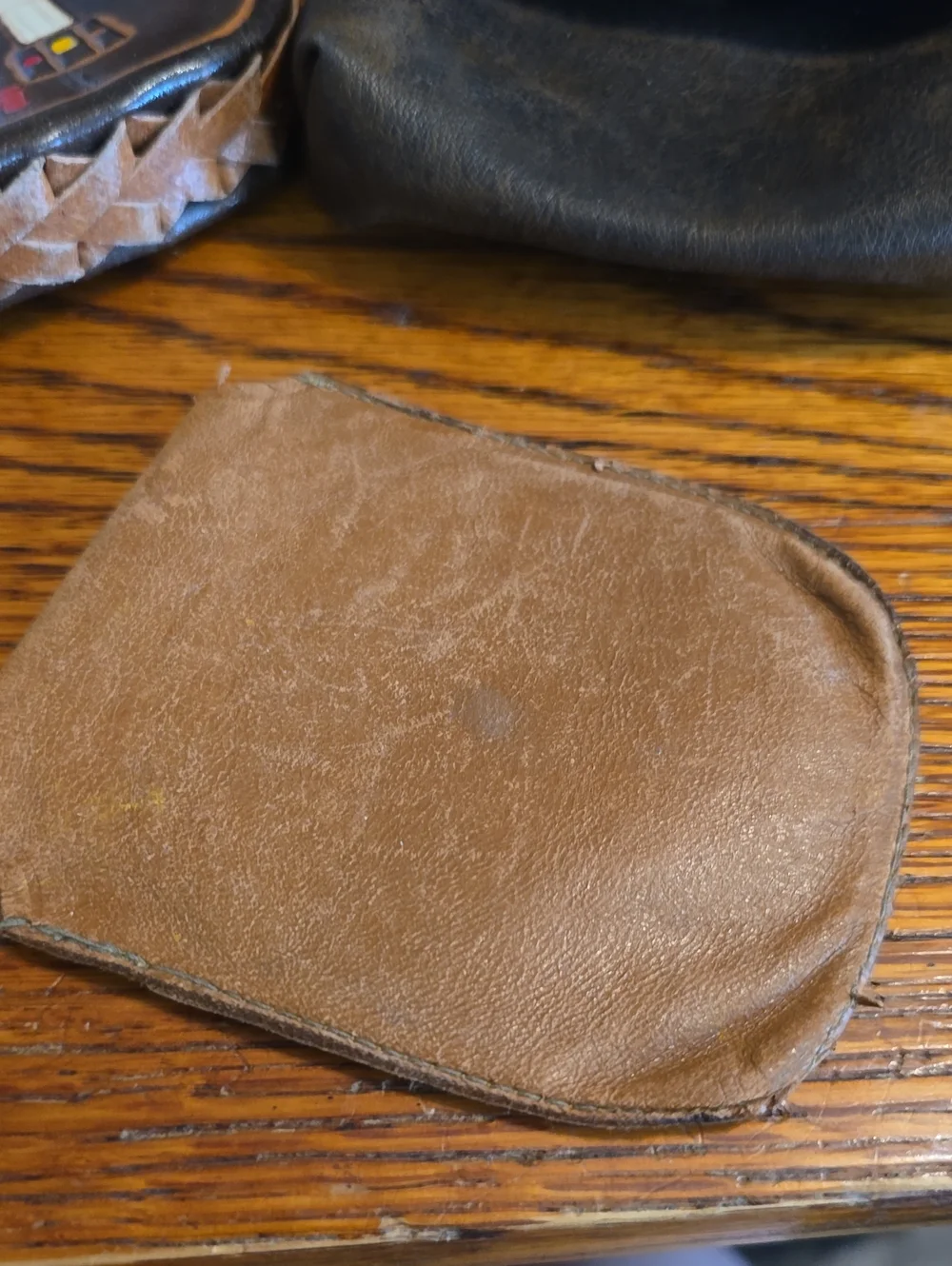 Source Unknown compact leather